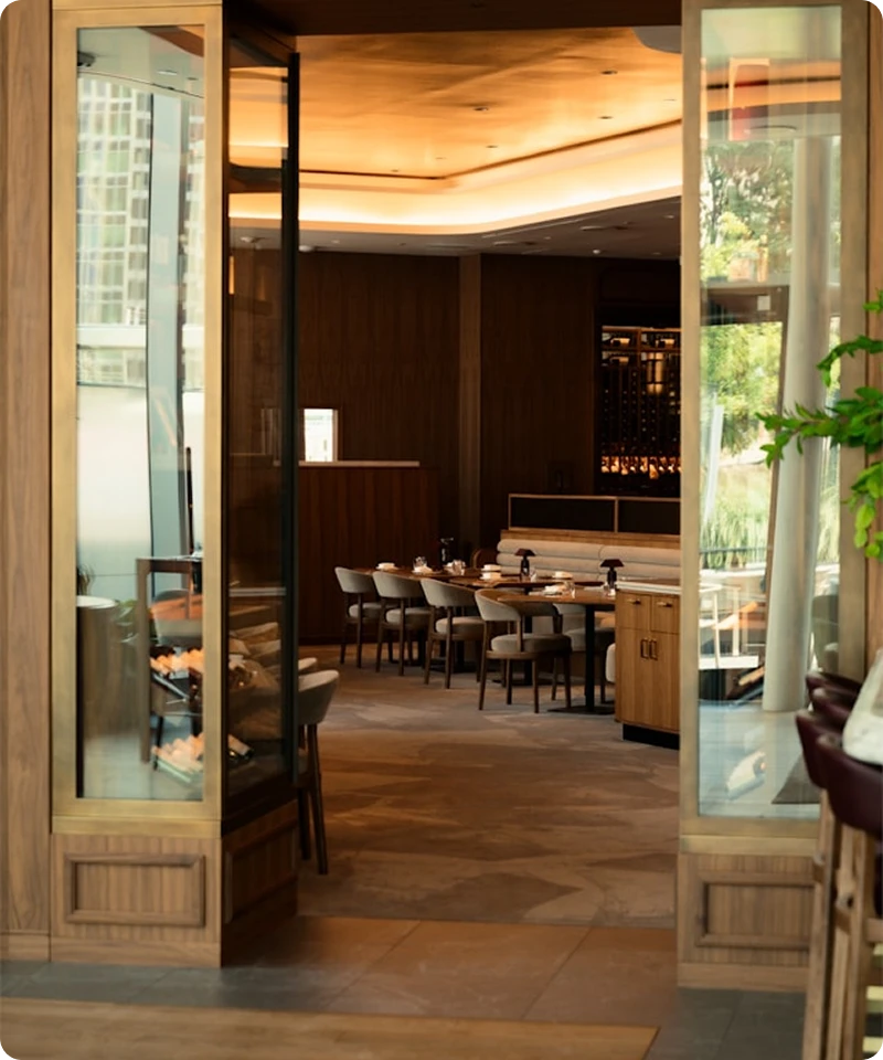 Dunya Lounge dining area with warm ambient lighting and gold accents
